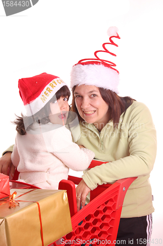 Image of mother and daughter and the shopping cart