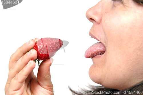 Image of beautiful woman with beautiful red strawberries, healthy food