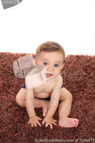 Image of happy baby boy, studio photo session