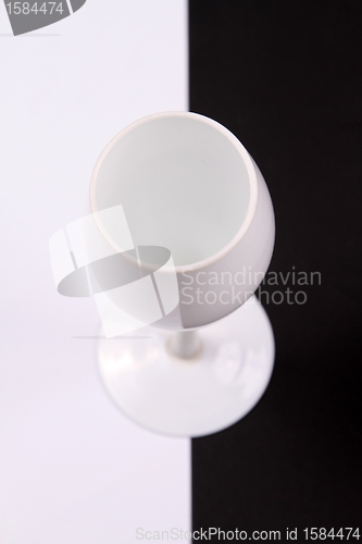 Image of black and white cup over black and white background