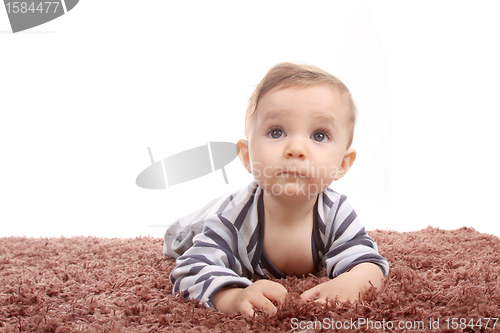 Image of happy baby boy, studio photo session