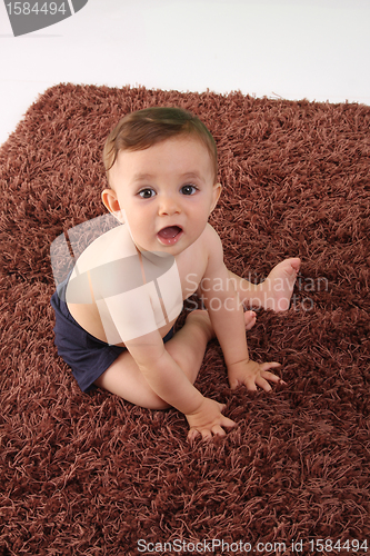 Image of happy baby boy, studio photo session