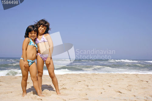 Image of beautiful girl in bikini in the beach, summer photo