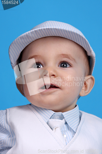 Image of Portrait of a happy baby boy Isolated on blue background