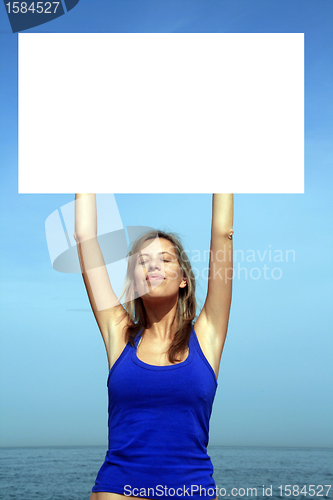 Image of sexy fashion girl with publicity board