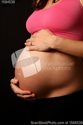 Image of beautiful pregnant woman expecting a boy