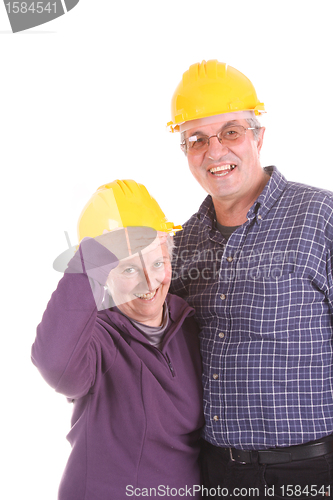 Image of mature couple architects, studio photo