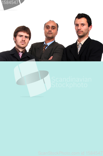 Image of happy sucessfull businessteam with publicity board