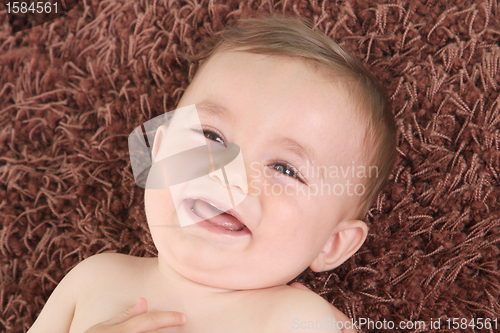 Image of happy baby boy, studio photo session