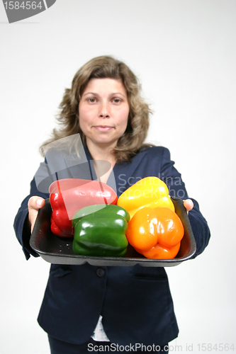 Image of woman with colored peppers, healthy food photo