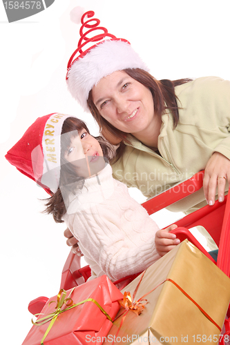 Image of mother and daughter and the shopping cart