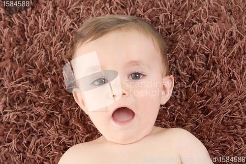 Image of happy baby boy, studio photo session