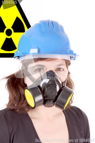 Image of woman with safety protection, gas mask and helmet