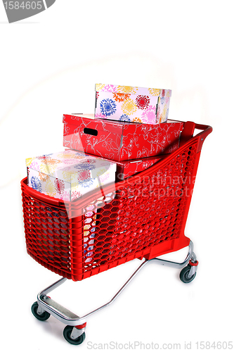Image of Shopping cart with lots of presents isolated on white background