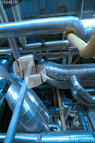 Image of Industrial zone, Steel pipelines and cables in blue tones