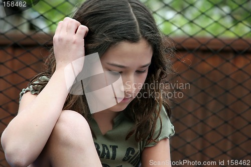 Image of Girl thinking outdoors