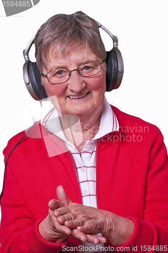 Image of pensioner with headphones