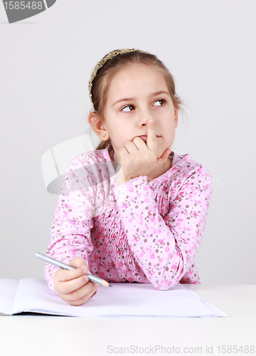 Image of Schoolgirl making homework