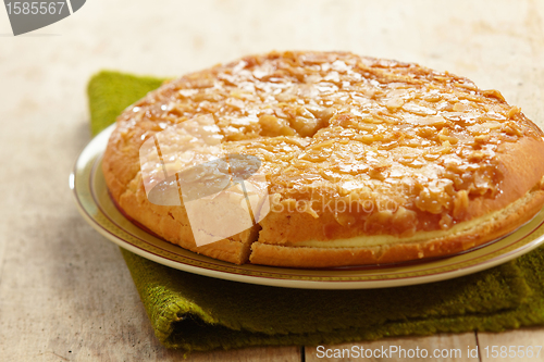 Image of home made almond cake with butter cream

