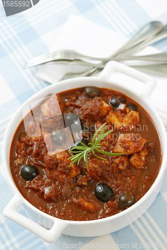 Image of meat soup with olives