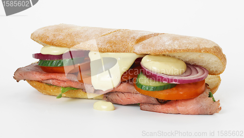 Image of sandwich with meat and vegetables