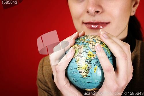 Image of Globe in a girl's hands