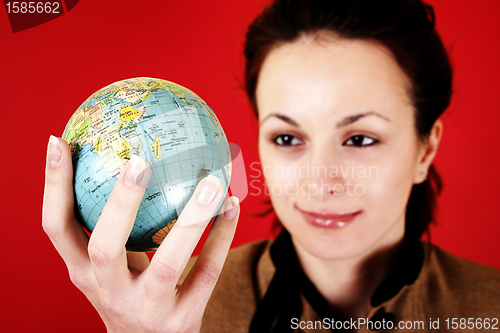 Image of Globe in a girl's hands