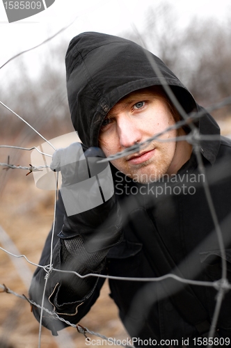 Image of Hooded man