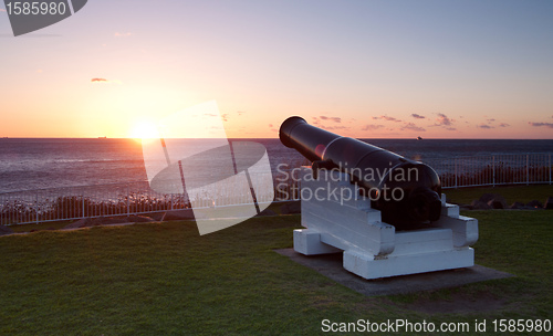 Image of ocean sunrise and cannons at wollongong