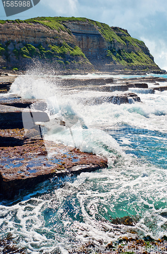 Image of waves on rocks at the coast