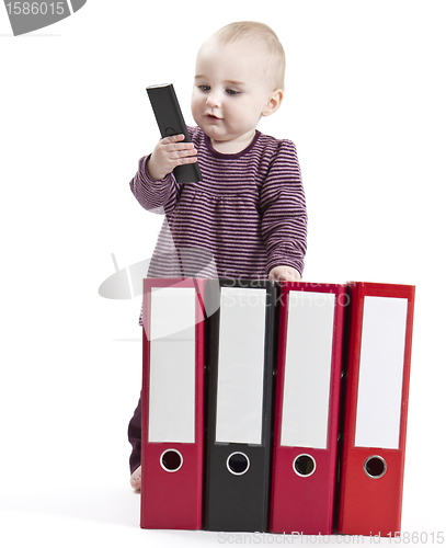 Image of young child with ring file