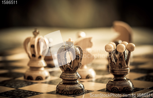 Image of chess with focus to black king in front