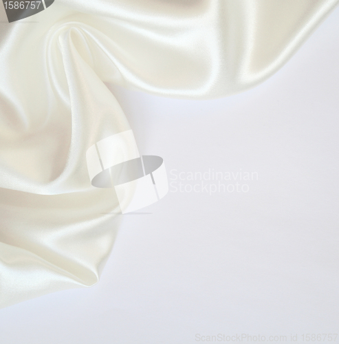 Image of Smooth elegant white silk as background 