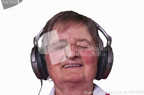 Image of pensioner with headphones