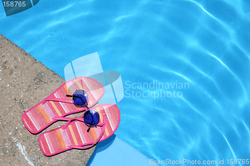 Image of Shoes by Pool