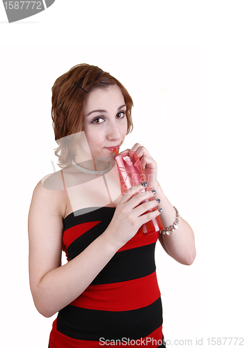 Image of Girl drinking juice.