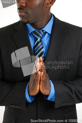 Image of Business man praying