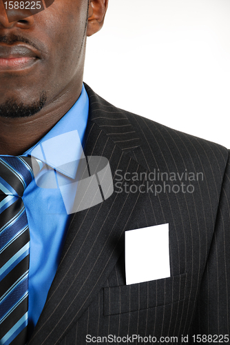 Image of Business man with business card in the pocket
