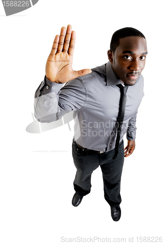 Image of Business man with his hand up