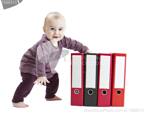 Image of young child with ring file