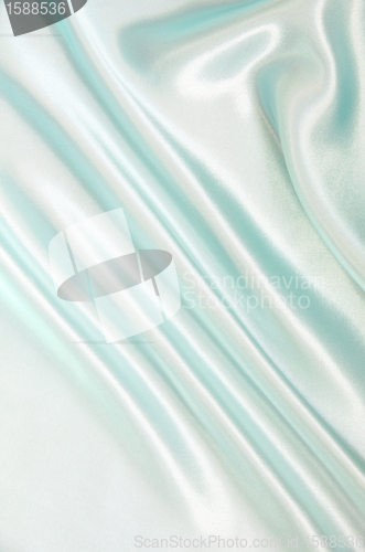 Image of Smooth elegant blue silk can use as background 