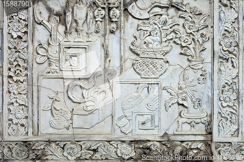 Image of White stucco , thai style on the Wall