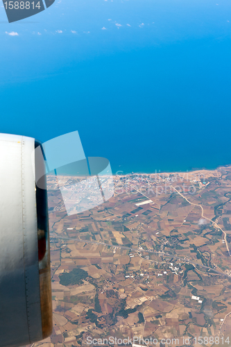 Image of View through airplane porthole