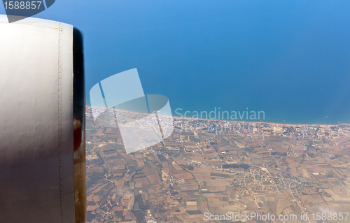 Image of View through airplane porthole