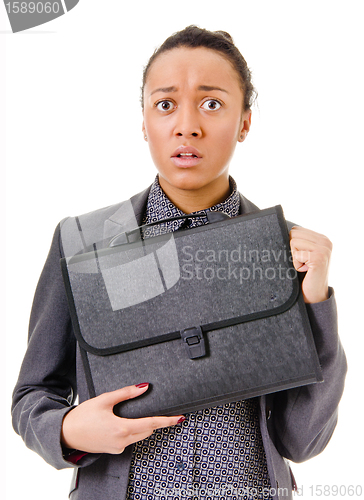 Image of Terrified young business woman on white