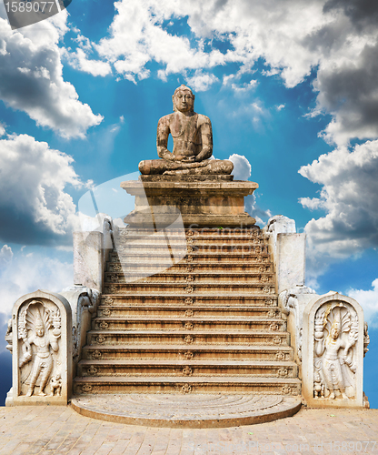 Image of statue of a meditating Buddha against the sky. A collage of many