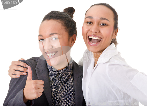 Image of carelessness. two beautiful women looking at the camera