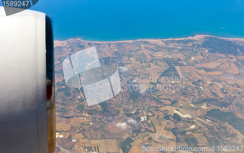 Image of View through airplane porthole