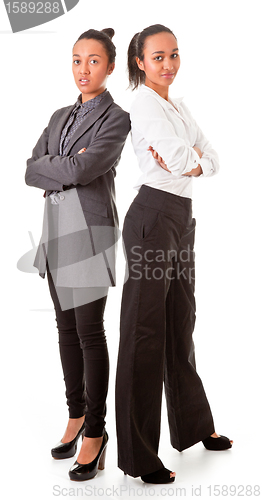 Image of two business  women in casual poses