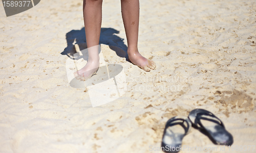 Image of Beach sandal on the sandy sea coast